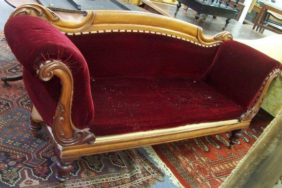 Appraisal: An early Victorian twin scroll end sofa with moulded show