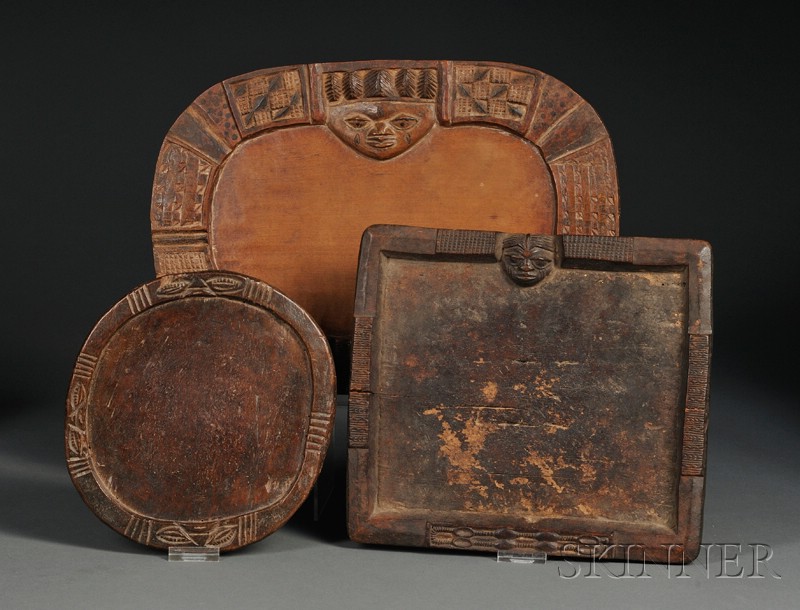 Appraisal: Three African Carved Wood Divination Trays Yoruba various shapes and