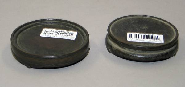 Appraisal: Two bronze circular stands th Century each originally supporting a