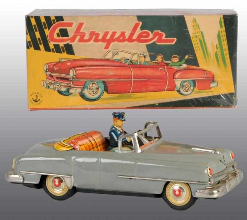 Appraisal: Tin Chrysler Automobile Friction Toy Description Japanese Working Made by