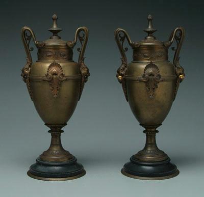 Appraisal: Pair bronze urns bold mounts looped handles with animal heads