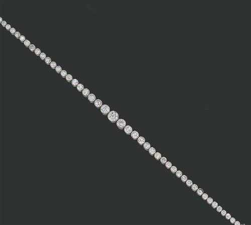 Appraisal: DIAMOND BRACELET ca Platinum Fine Rivi re model slightly graduated