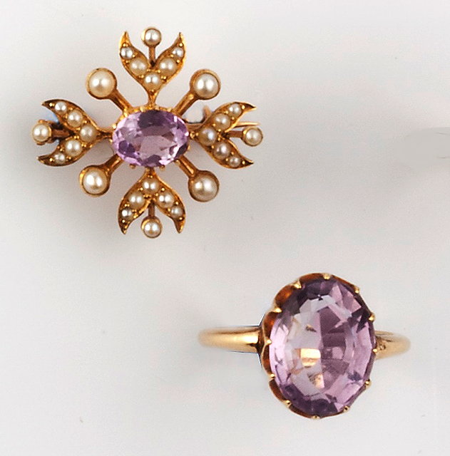 Appraisal: AN AMETHYST AND HALF PEARL BROOCH AND AN AMETHYST RING