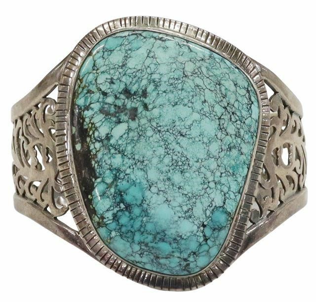 Appraisal: Southwest sterling silver cuff bracelet featuring a large bezel-set turquoise