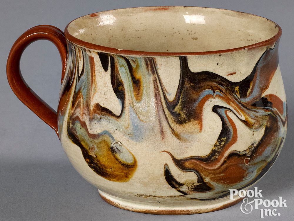 Appraisal: Mocha mug with marbleized glaze Mocha mug with marbleized glaze