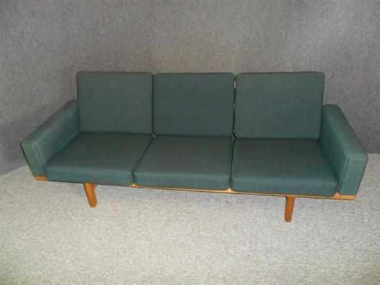 Appraisal: HANS WEGNER - A GE- SOFA with oak frame and