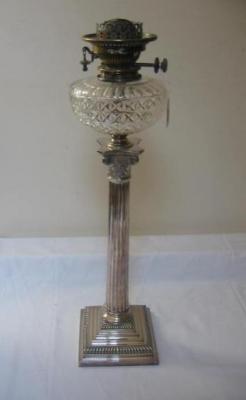 Appraisal: A VICTORIAN TABLE LAMP of Corinthian column form on stepped