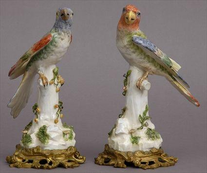 Appraisal: PAIR OF MEISSEN-STYLE PORCELAIN FIGURES OF PARROTS ON LOUIS XV-STYLE