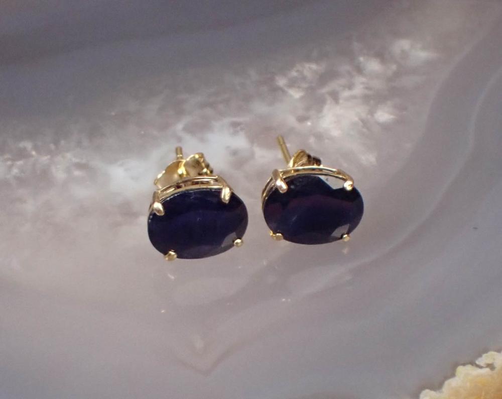 Appraisal: PAIR OF SAPPHIRE AND FOURTEEN KARAT GOLD EAR STUDS each