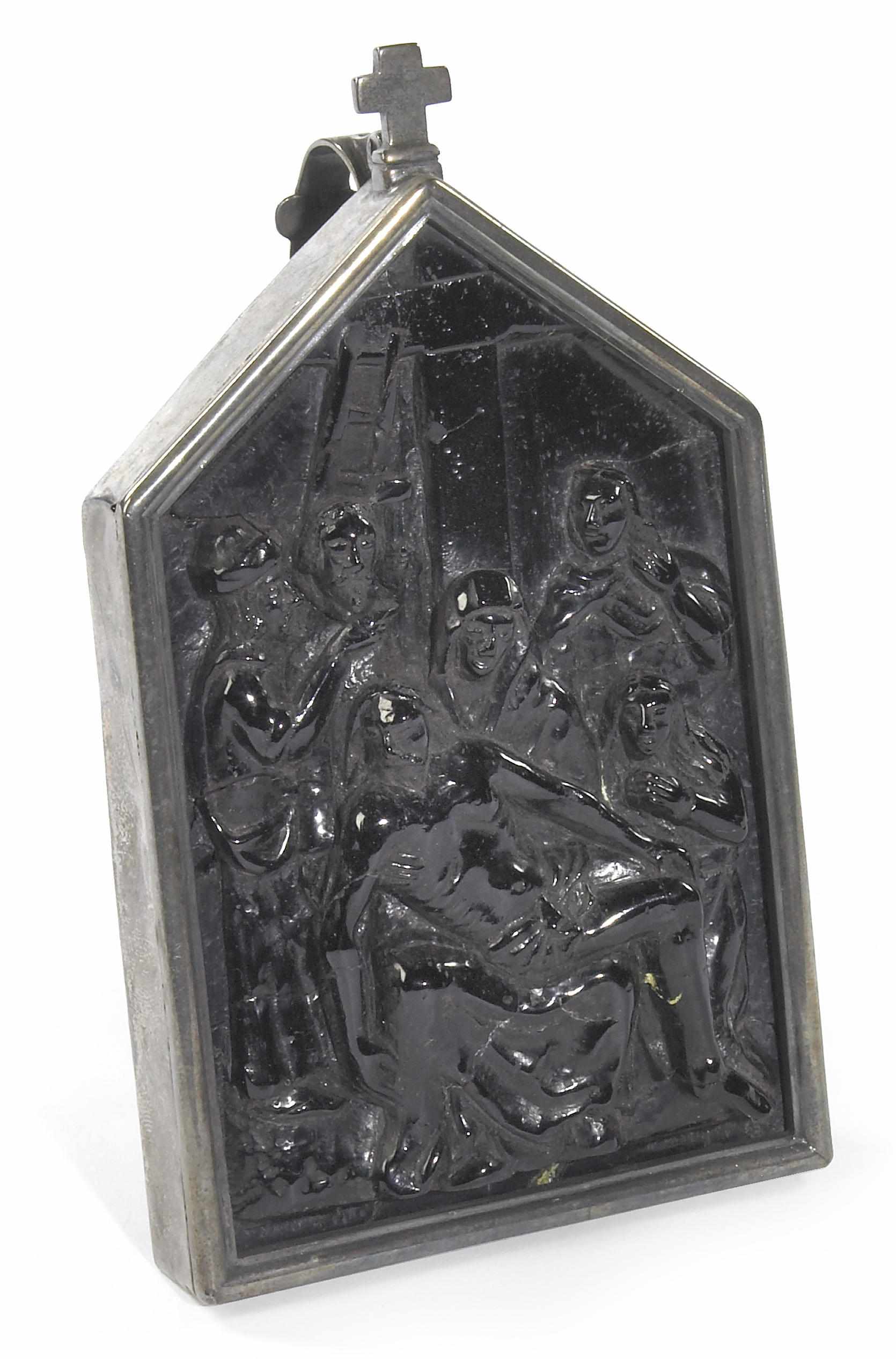 Appraisal: A Spanish carved jet relief of the Pieta together with