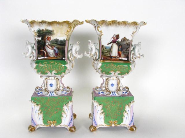 Appraisal: Pair of porcelain Old Paris type pedestal urns green and