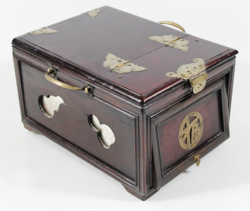 Appraisal: A thC Chinese polished wooden vanity case with articulated top