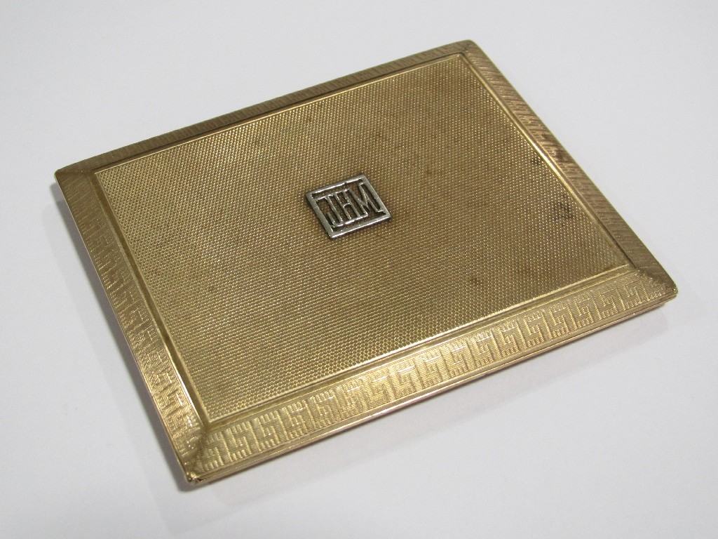 Appraisal: A nine cart gold cigarette case engine turned decorated to