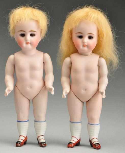 Appraisal: Lot of Kestner All-Bisque Dolls Description Both faces with multi-stroked