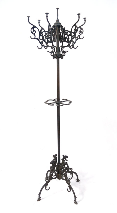 Appraisal: CAST IRON VICTORIAN COAT RACK Ornate scroll work on legs