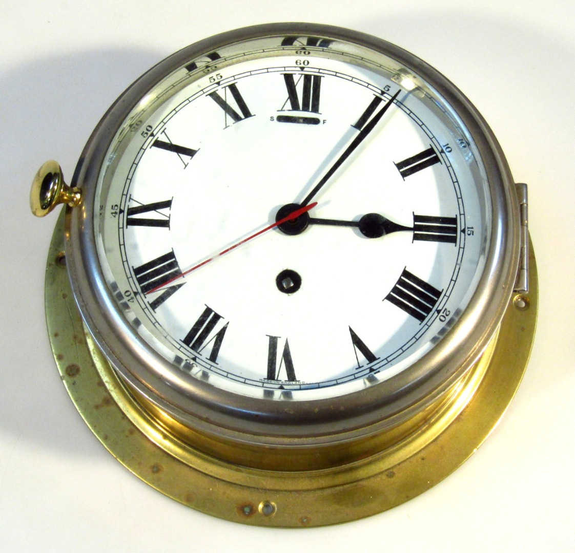 Appraisal: A early thC brass cased bulk head clock with cm