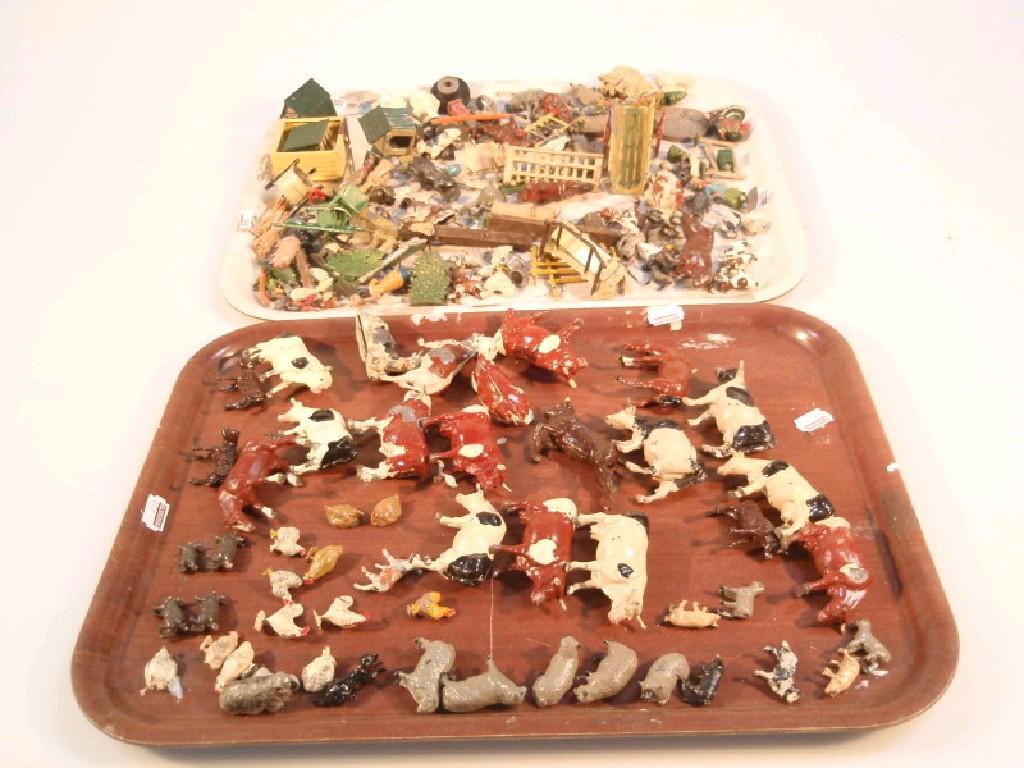 Appraisal: Vintage lead farm animals figures and small buildings Two trays