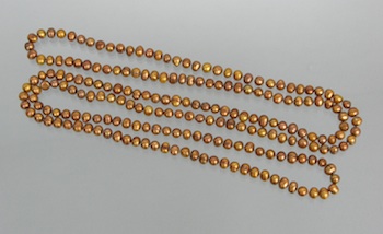 Appraisal: A Strand of Bronze Color Freshwater Cultured Nugget Pearls A