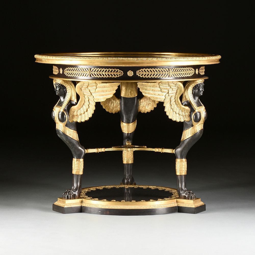 Appraisal: A RUSSIAN EMPIRE STYLE GRANITE TOPPED GILT AND PATINATED BRONZE