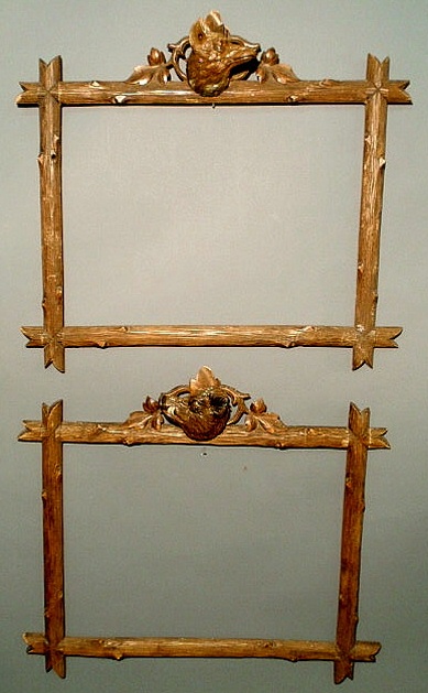 Appraisal: Pair of Black Forrest carved frames one with fox head