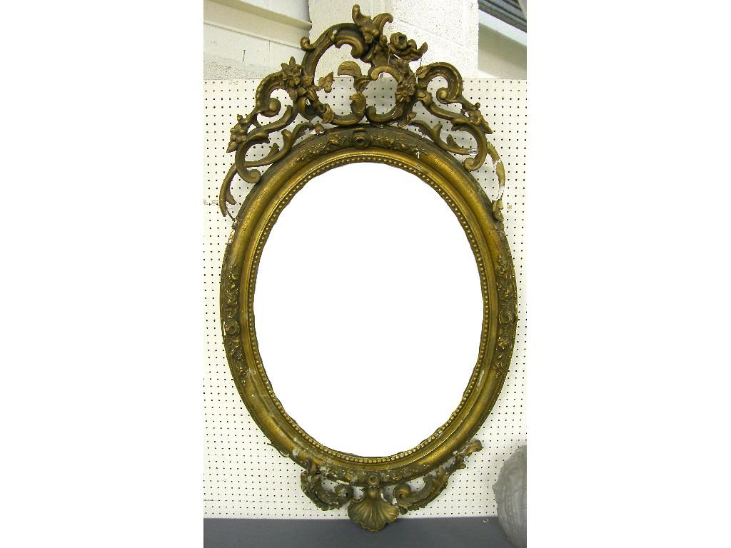 Appraisal: th century oval wall mirror within a beaded moulded frame