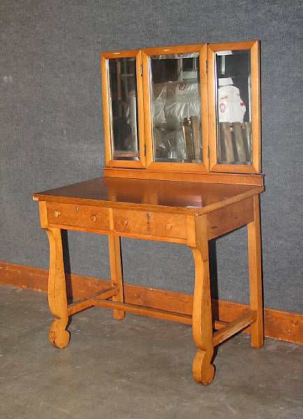 Appraisal: A Classical style bird's eye maple dressing table early th