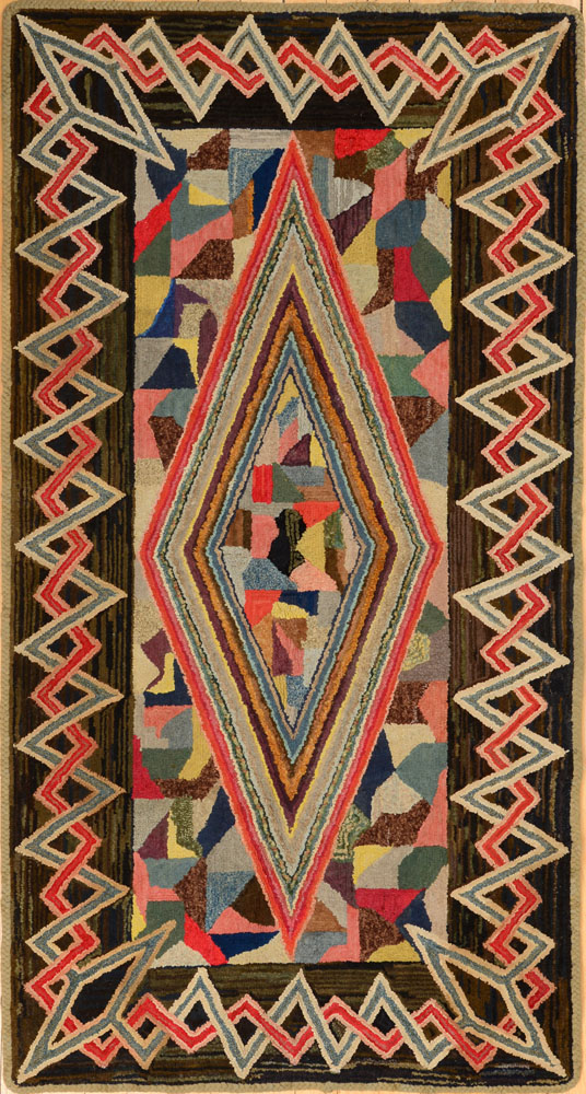 Appraisal: AMERICAN HOOKED RUG Worked with oblong diamond within black-ground entwined