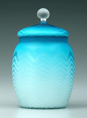 Appraisal: Mother-of-pearl lidded canister blue herringbone pattern frosted glass finial in