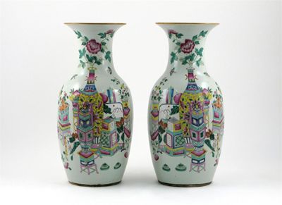 Appraisal: A pair of Chinese famille rose vases painted with screens