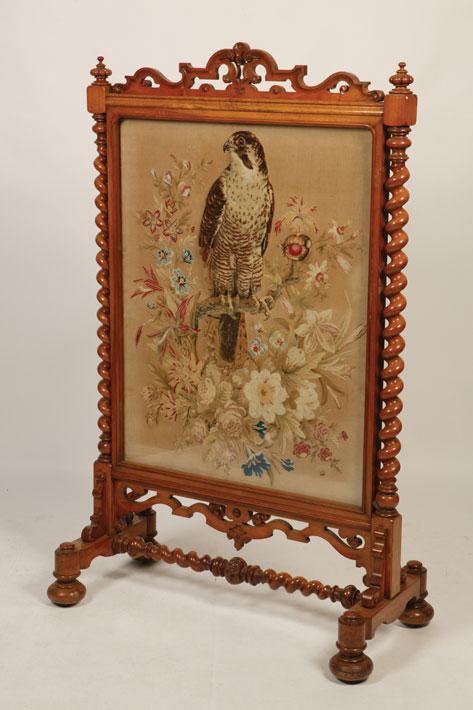 Appraisal: A LARGE VICTORIAN WALNUT FRAMED FIRESCREEN with a scrolling top