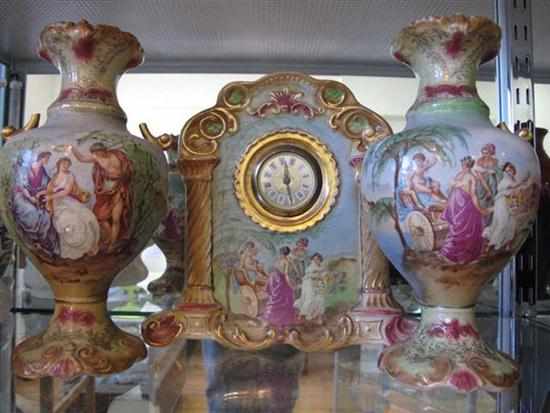 Appraisal: EDWARDIAN CHINA CLOCK GARNITURE LOSSES