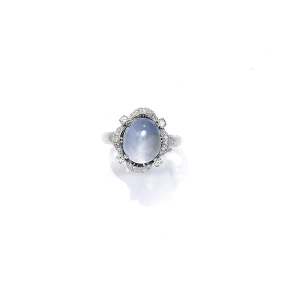 Appraisal: AN ASTERIA SAPPHIRE AND DIAMOND RING circa White gold Elegant