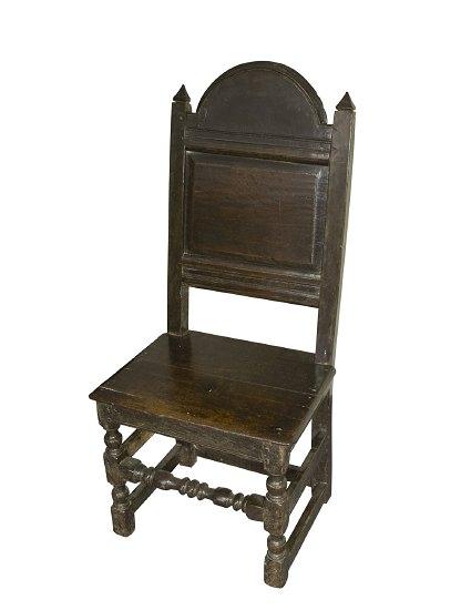 Appraisal: An early th Century oak chair with arch top back