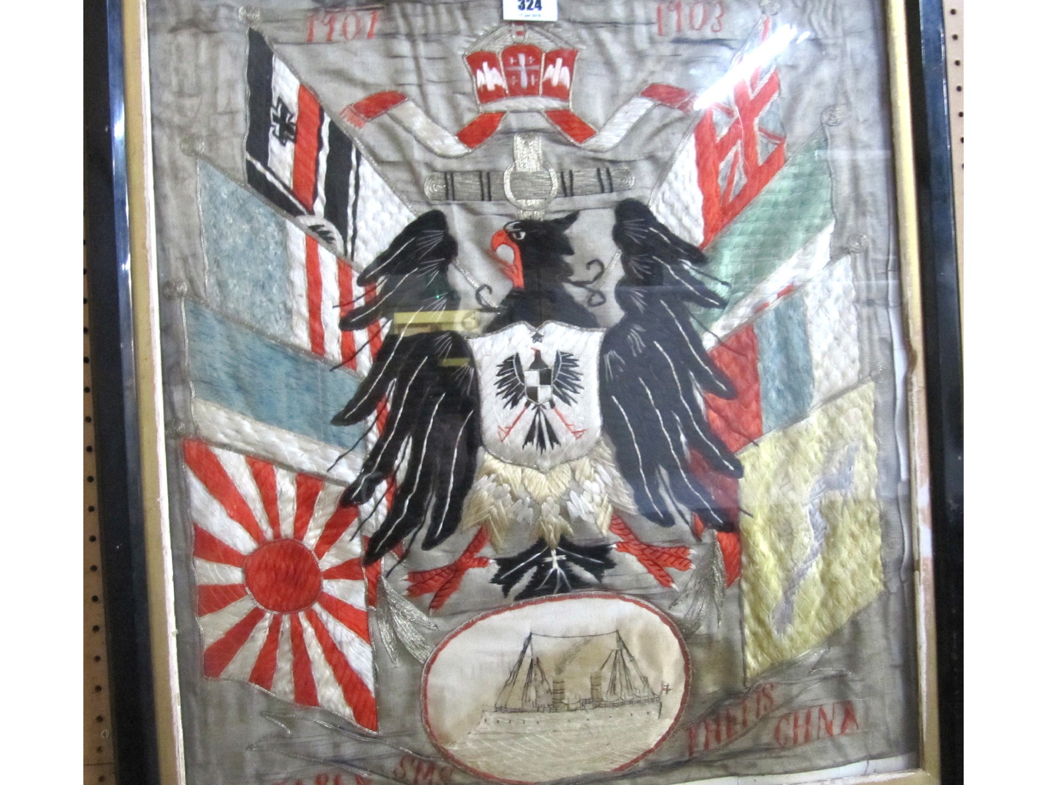 Appraisal: A framed embroidery concerning Japan and Germany -