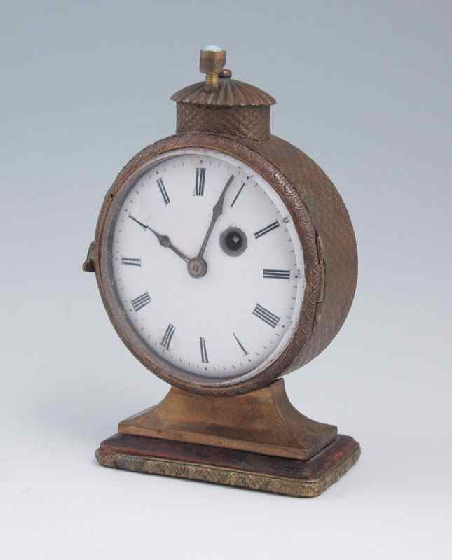 Appraisal: WEESTON TH CENTURY MINIATURE BRONZE CLOCK Bronze case with fish