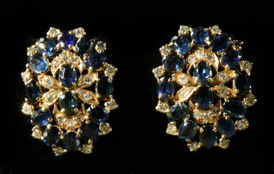 Appraisal: PAIR YELLOW GOLD SAPPHIRE AND DIAMOND OVAL EARRINGS Openwork settings