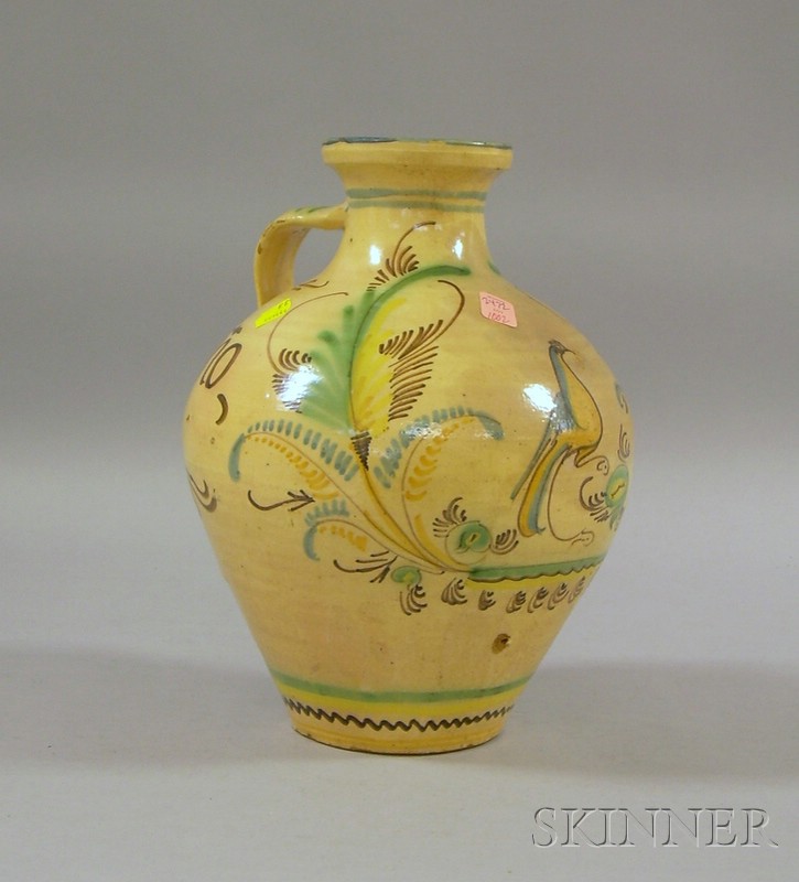 Appraisal: Floral and Bird Decorated Glazed Earthenware Jug ht in