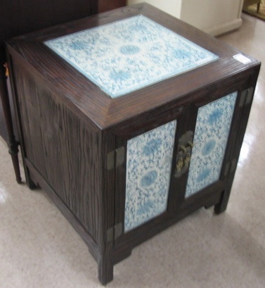 Appraisal: CHINESE PINE AND PORCELAIN PANELED END CABINET of square form