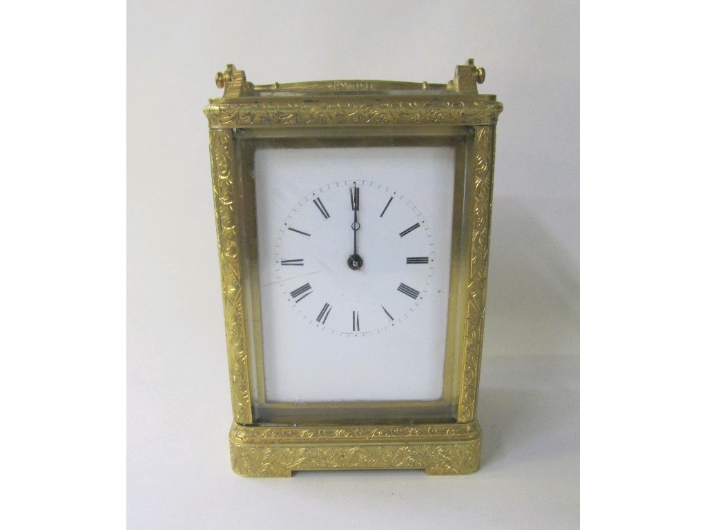 Appraisal: French brass cased carriage clock with chased decoration marked Auguste