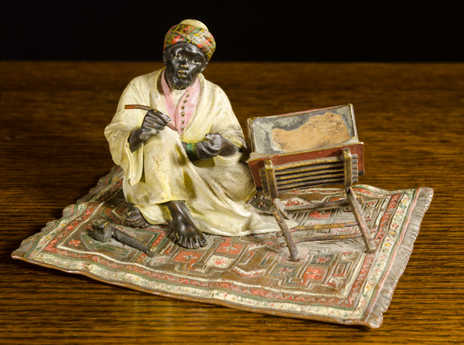 Appraisal: COLD PAINTED BERGMANN BRONZE SCULPTURE Arab scribe on carpet next