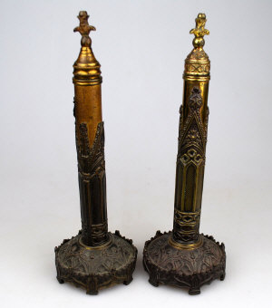 Appraisal: A pair of Victorian Gothic design face-screen stands with screw-top