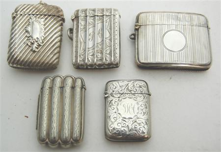 Appraisal: A group of fluted silver vesta cases a large semi