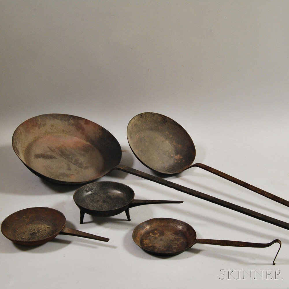 Appraisal: Five Wrought and Cast Iron Skillets America late th early