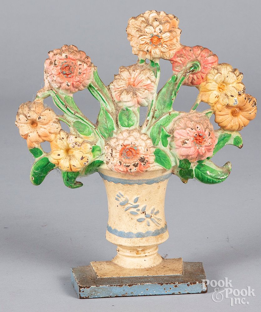 Appraisal: Hubley cast iron zinnia in urn doorstop Hubley cast iron