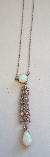 Appraisal: A late Victorian diamond and opal set pendant necklace the