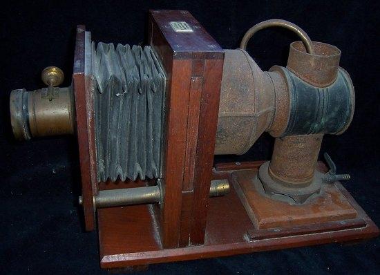 Appraisal: A mahogany cased projector by W Hume Edinburgh cm wide