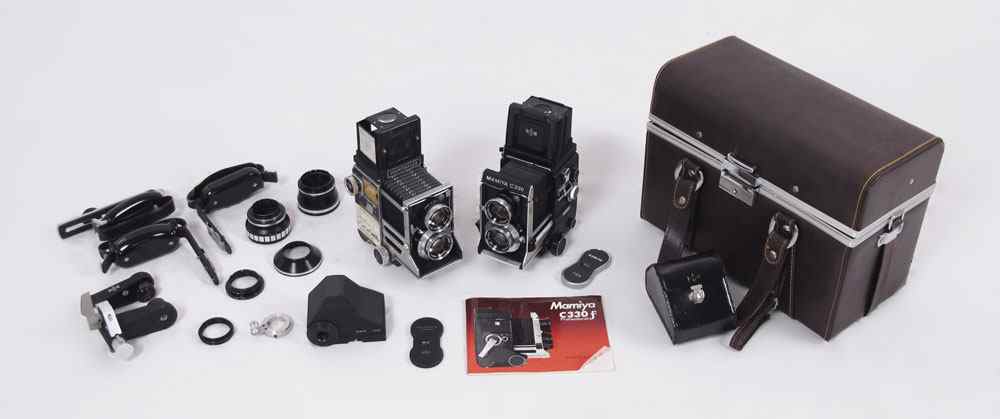 Appraisal: PAIR OF MAMIYA CAMERAS WITH ACCESSORIES To include Mamiya C