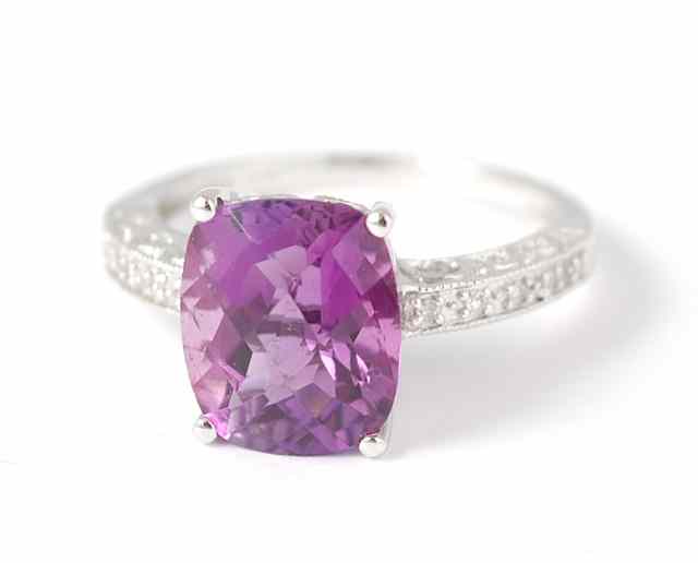 Appraisal: AMETHYST DIAMOND AND FOURTEEN KARAT WHITE GOLD RING featuring a