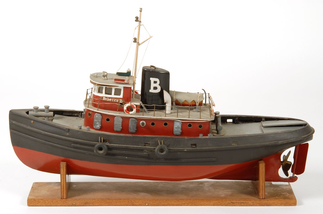 Appraisal: MODEL OF THE TUGBOAT REBECCA B With plank-on-frame construction Motorized