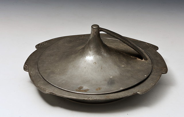 Appraisal: Liberty Co Pewter muffin dish and cover attributed to Archibald